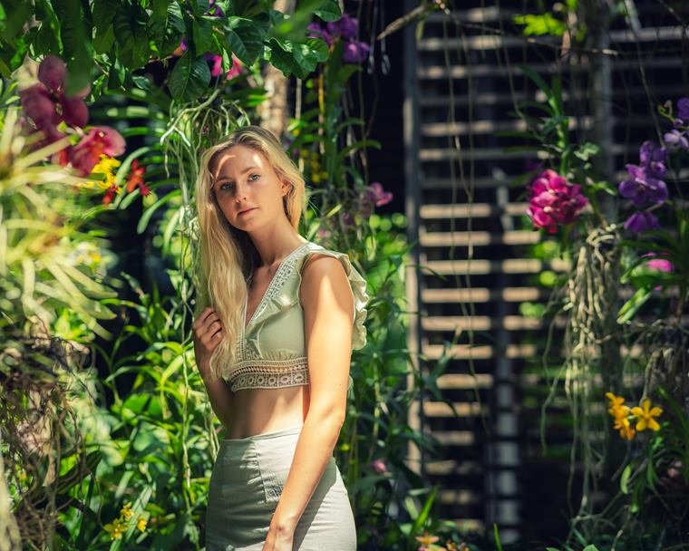 Portrait in a garden trellis